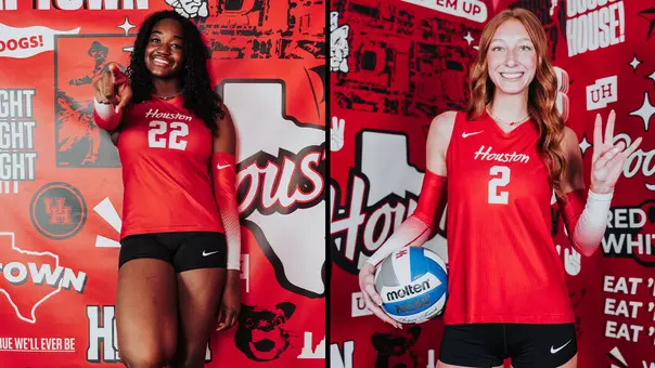 Harmoni Dobbins and Olivia Stringer pose for pictures during their visit.