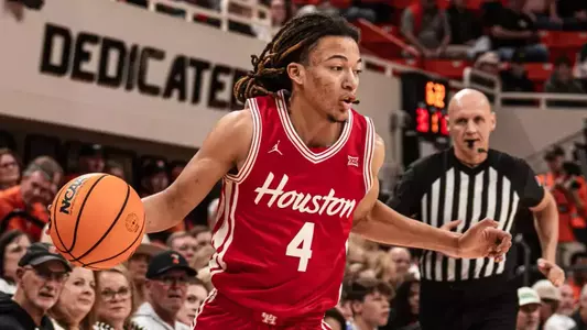 Kingston Flemings dribbling a basketball in Gallagher-Iba Arena