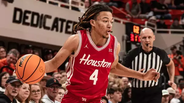 Kingston Flemings dribbling a basketball in Gallagher-Iba Arena