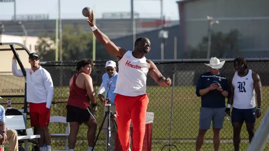 Cordell Nwokeji throwing shot put at Kirk Baptiste Invitational