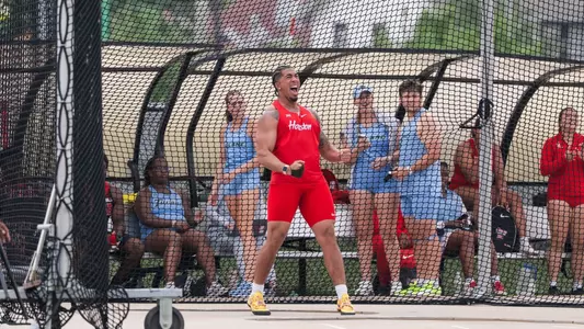 Ty Lott celebrating after a personal best mark in the hammer throw