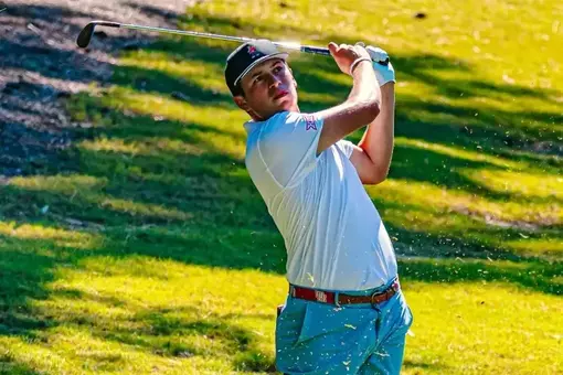 Grant Doggett watches his approach shot