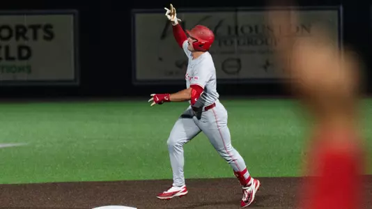 Cade Climie jogs around the bases after hitting a homer