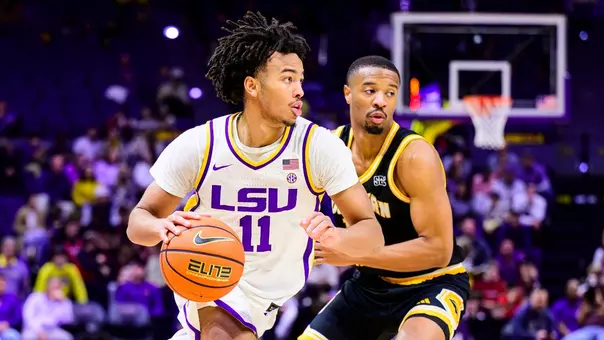 Dedan Thomas Jr. dribbles while playing for LSU.