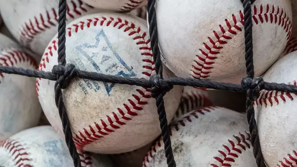 Baseball with faded Big 12 logo