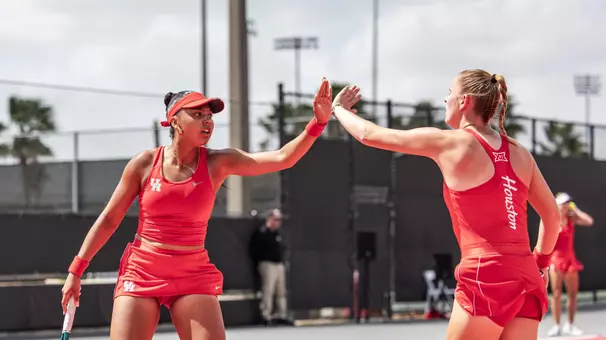 Sophie Schouten and Chems Doha Zeghlouli high five