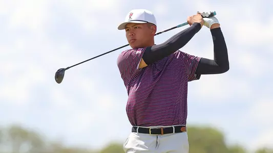 Hsuan-Yi Chen watches his tee shot