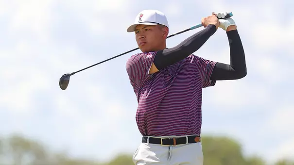 Hsuan-Yi Chen watches his tee shot