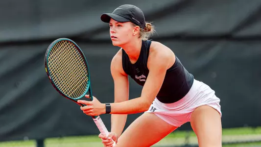 tennis player set to receive serve