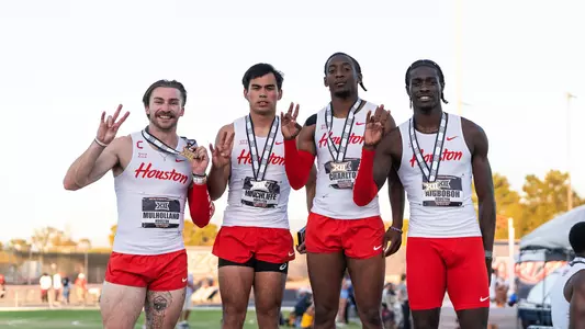 Ryan Mulholland, Louie Hinchliffe, Dakari Charlton, Sean Aigboboh holding Cougars sign wearing Big 12 medals