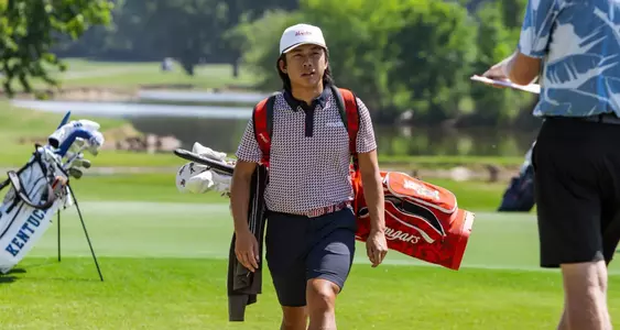 Chi Chun Chen walks with his back on his shoulders during NCAA Bermuda Run Regional