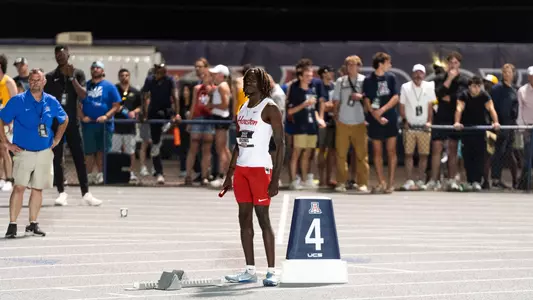 Damarien Jacobs standing with baton in hand