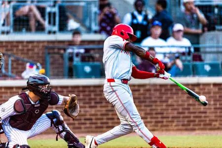 Tre Broussard hitting