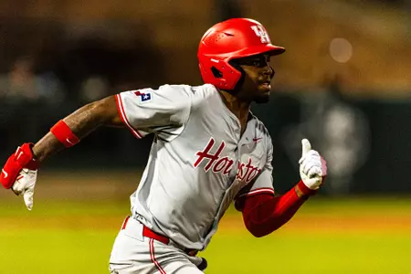 Tre Broussard runs to first after a hit