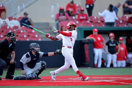 Tre Broussard follows through a swing