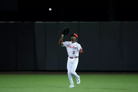 Tre Broussard fields a fly ball