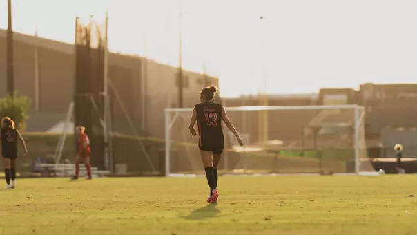 Laney Gonzales in front of sunset