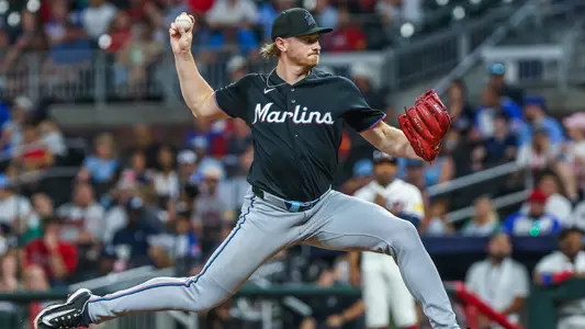 Aug 5, 2026; Cumberland, Georgia, USA; Miami Marlins pitcher Josh Ekness (95) pitches the ball against the Atlanta Braves during the eighth inning at Truist Park. Mandatory Credit: Jordan Godfree-Imagn Images