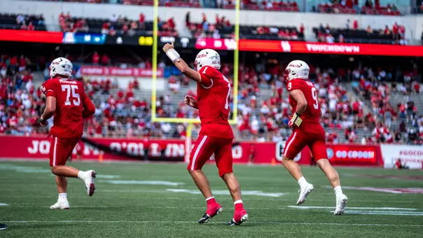 Conner Weigman gives a thumbs up running off the field