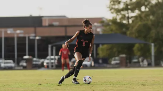 Blake Hodgson dribbles the ball