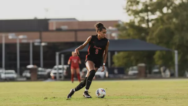 Blake Hodgson dribbles the ball