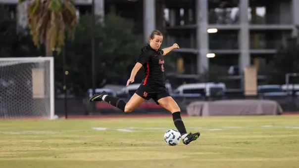 Peyton Machado getting ready to kick soccer ball with right foot