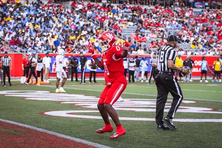 Amare Thomas dancing in the end zone after scoring a touchdown