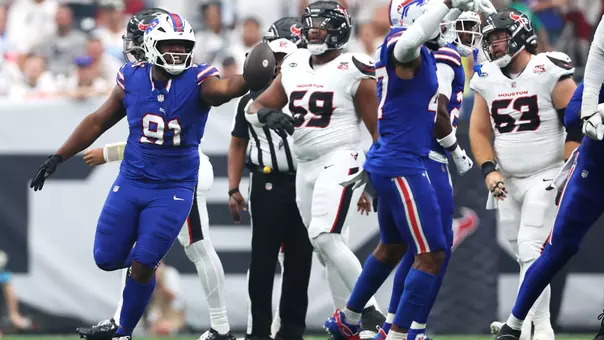 Sep 13, 2026; Houston, Texas, USA; Buffalo Bills defensive tackle Ed Oliver (91) reacts after a recovery during the first quarter against the Houston Texans at Reliant Stadium. Mandatory Credit: Troy Taormina-Imagn Images
