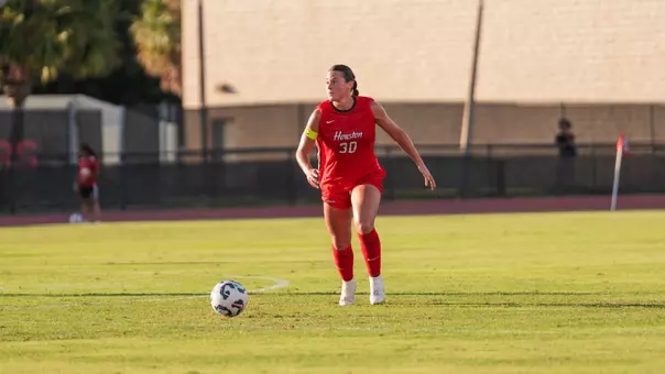Ella Morgan dribbles soccer ball