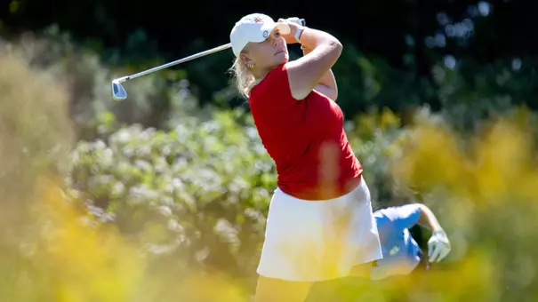 Emilia Väistö watches her shot at ANNIKA Intercollegiate