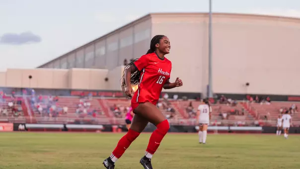 alex ledbetter celebrates after scoring a goal
