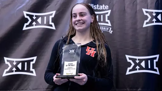 Michelle McLeod holding trophy