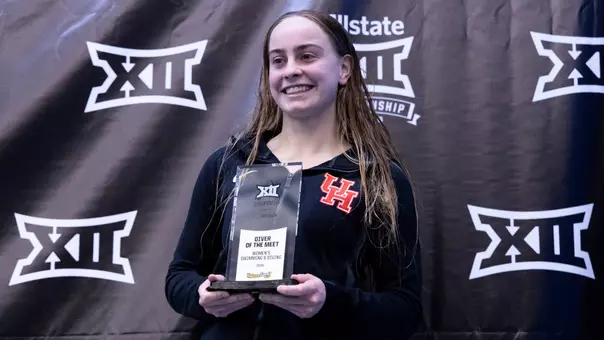 Michelle McLeod holding trophy