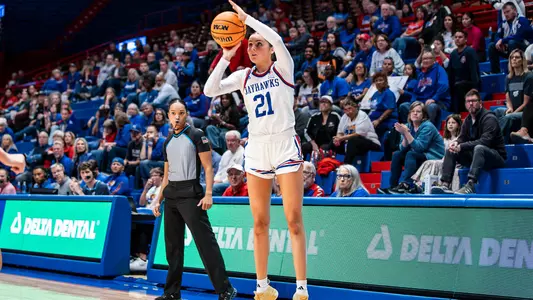 Lawrence, Kansas - November 1, 2024 - guard Elle Evans #21 of the Kansas Jayhawks during game between Kansas and Washburn at Allen Fieldhouse in Lawrence, KS. Photo by Emma Crouch/Kansas Athletics