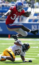 Jayhawks Improve to 4-0 with 35-28 Win Image