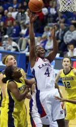 Morris Joins 1,000 Point Club as Kansas Defeats Michigan, 77-66 Image
