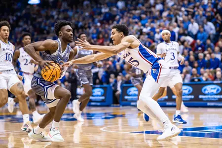 No. 9 Jayhawks Roll Over Pirates in Big 12-BIG EAST Battle Image