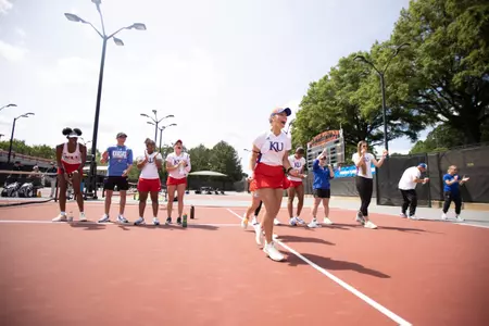 LAWRENCE, KS - May 05, 2023 - The Kansas Jayhawks tennis team during the match between NC State and the Kansas Jayhawks in Raleigh , NC. Photo by Elicia Castillo/Kansas Athletics.
