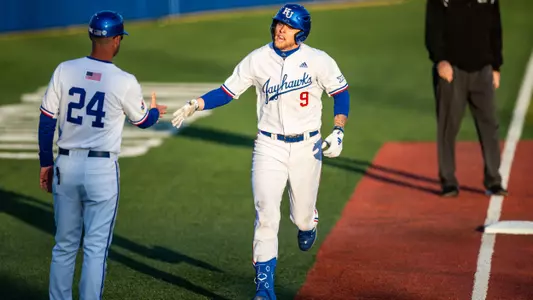 Dutton, Leto Lead Jayhawks to 11-2 Win in Home Opener Image