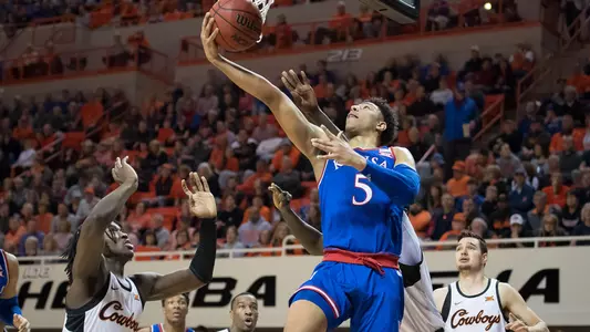 Jayhawks hold off Cowboys, 72-67 Image