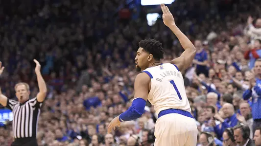 Jayhawks storm past Cowboys in second half, 84-72 Image