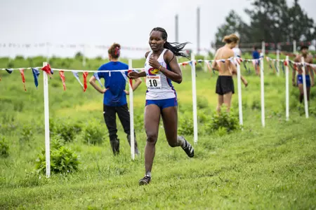 Latema Earns All-Big 12 Honors, Jayhawks Fifth and Sixth at Big 12 Championship Image