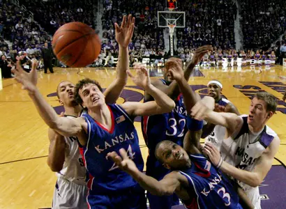 Streak Halted, Wildcats Top Jayhawks 84-75 Image
