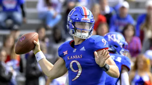 Kansas topped by Oklahoma State, 48-28 Image