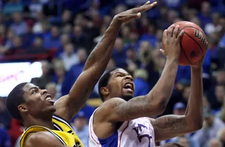 No. 3 Kansas Escapes Michigan with 67-60 Overtime Win Image