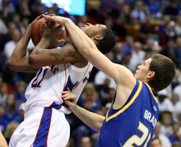 Collins Scores 16 To Lead No. 23 Kansas Basketball To 71-56 Win vs. UMKC Image