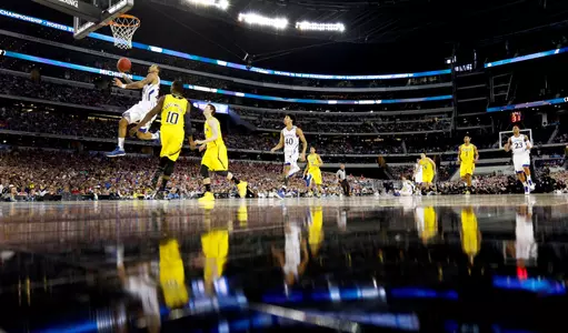 Kansas Run Ends with Loss to Michigan in Sweet 16 Image