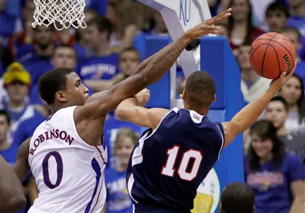 No. 15/14 Jayhawks Outlast Owls to Open Homestand, 77-54 Image