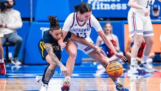 Jayhawks Fall to No. 25 West Virginia in Conference Opener Image