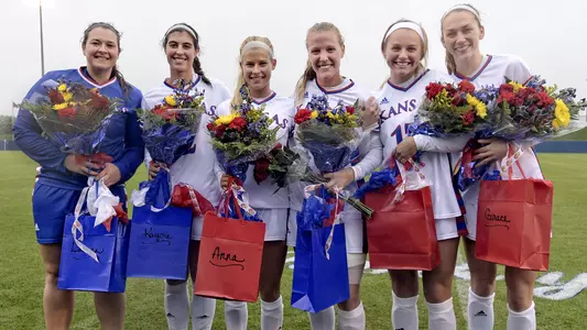 Jayhawks fall in OT on Senior Day Image